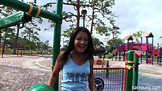 Kat Young teases her webcam viewers while she climbs at the playground