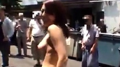 Japanese girl strips naked in crowded area