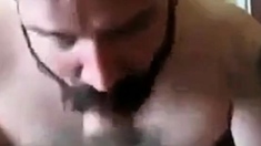 Bearded daddy sucks big hairy cock