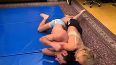 Dominating her man during wrestling match